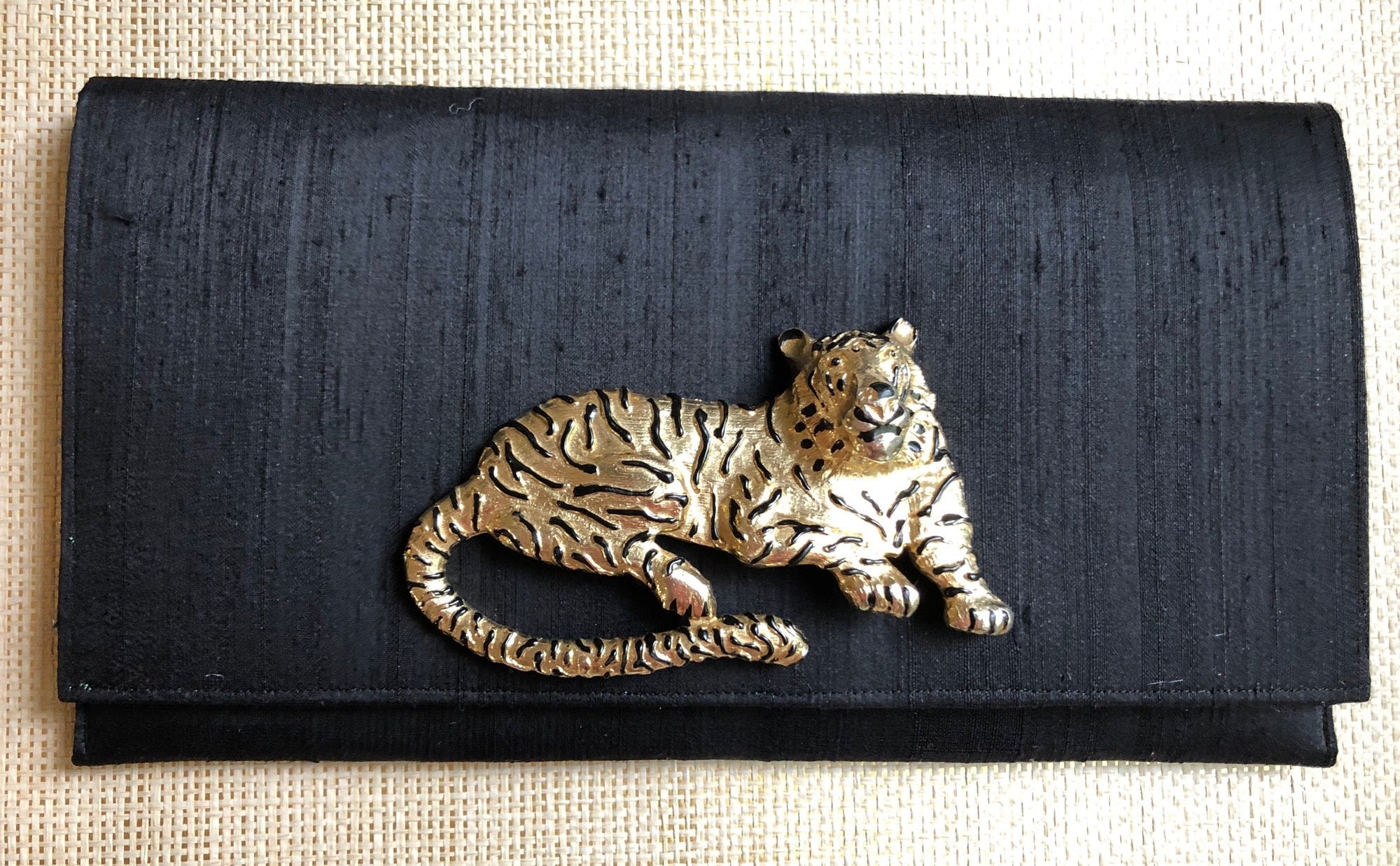 Meet the personalities behind each Garland Bag. Designer fabrics, stylish handcrafted clutches.