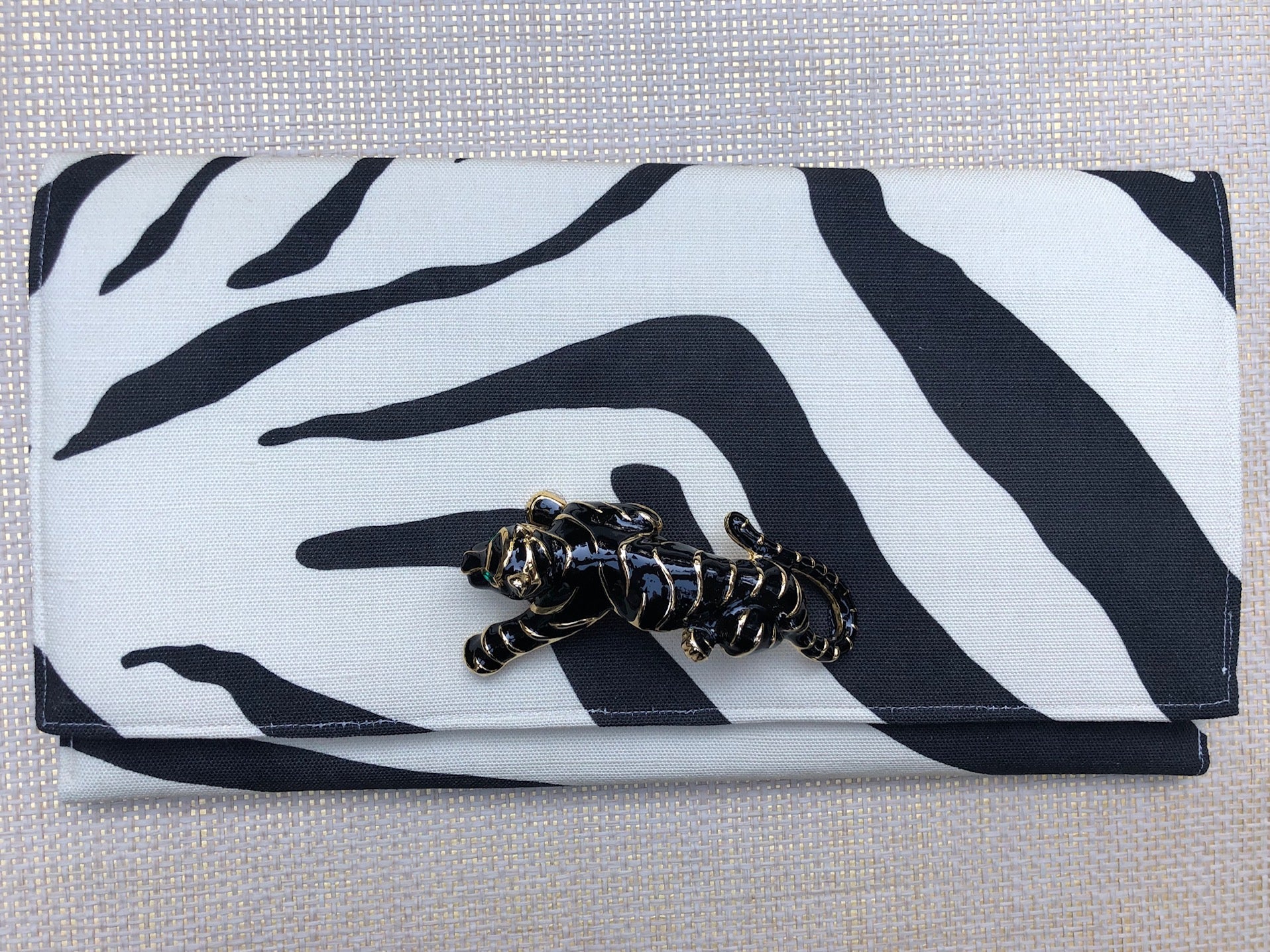 Meet the personalities behind each Garland Bag. Designer fabrics, stylish handcrafted clutches.