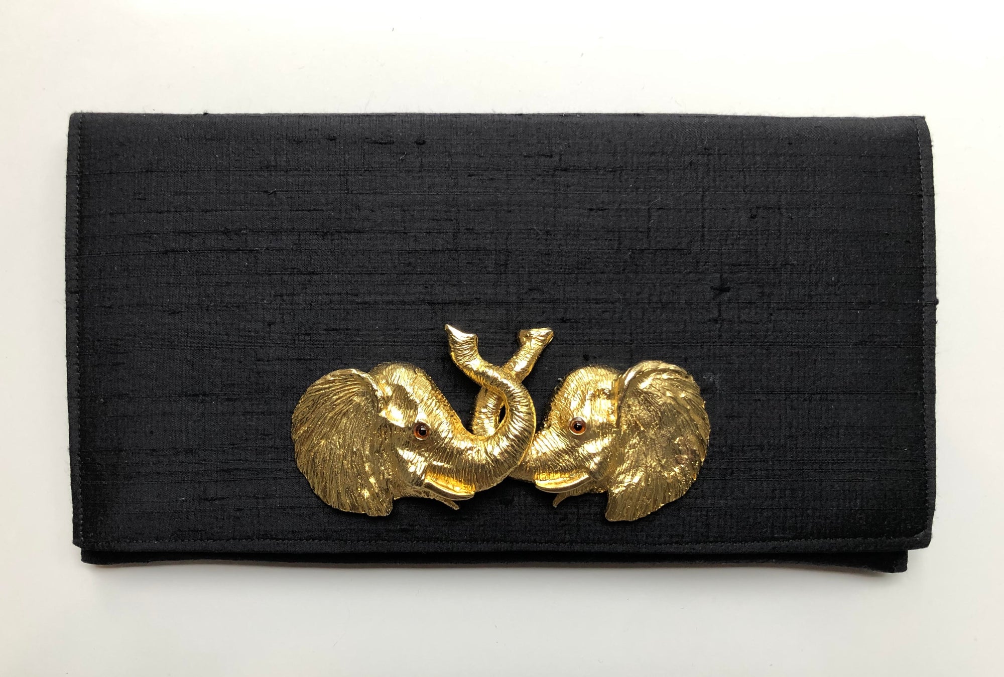 Meet the personalities behind each Garland Bag. Designer fabrics, stylish handcrafted clutches.