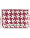 Handbag with red and white houndstooth pattern on a white background